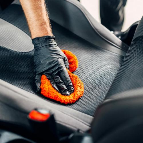 Chemical cleaning of car seats with spoonge